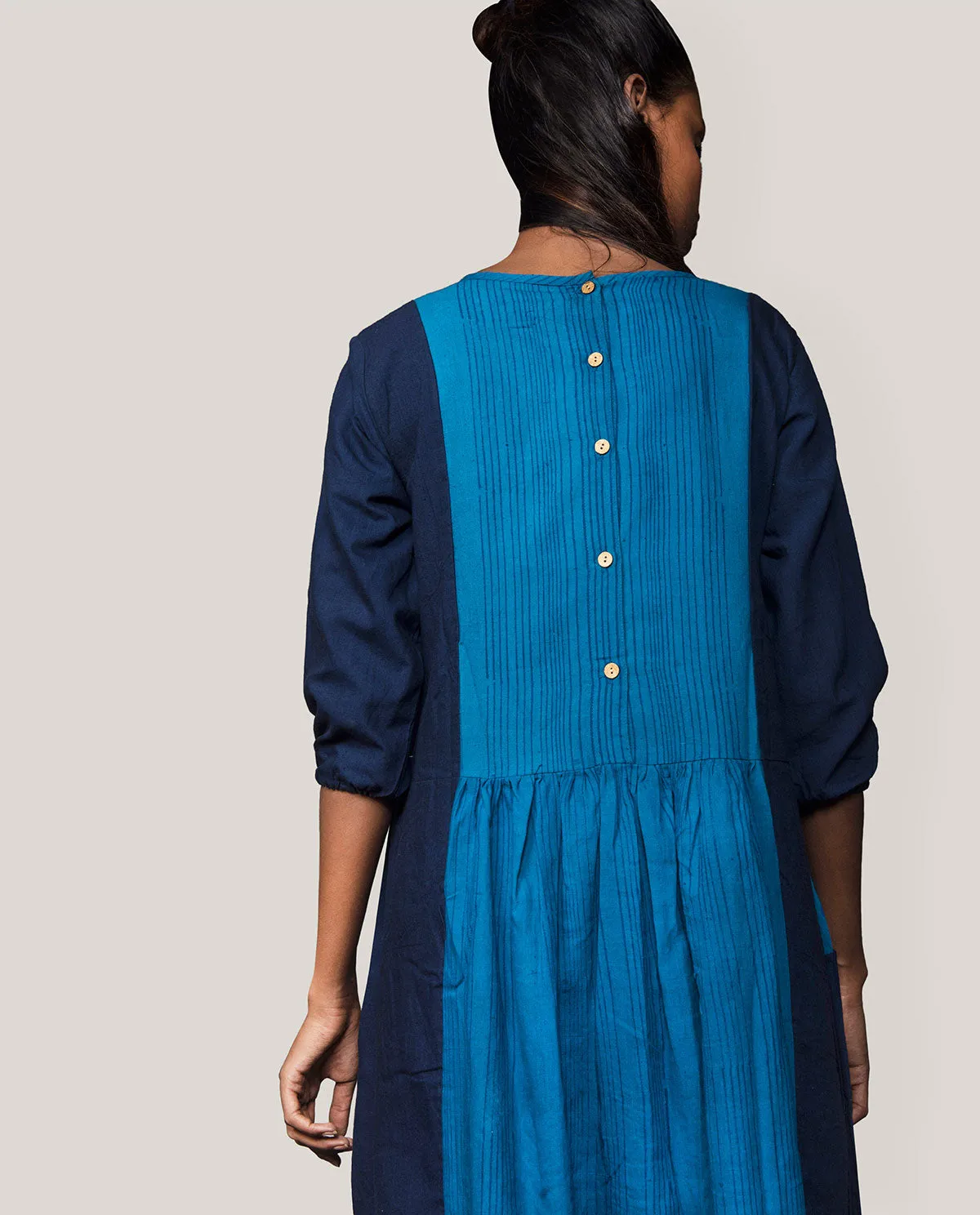 FRONT PLEATED DRESS